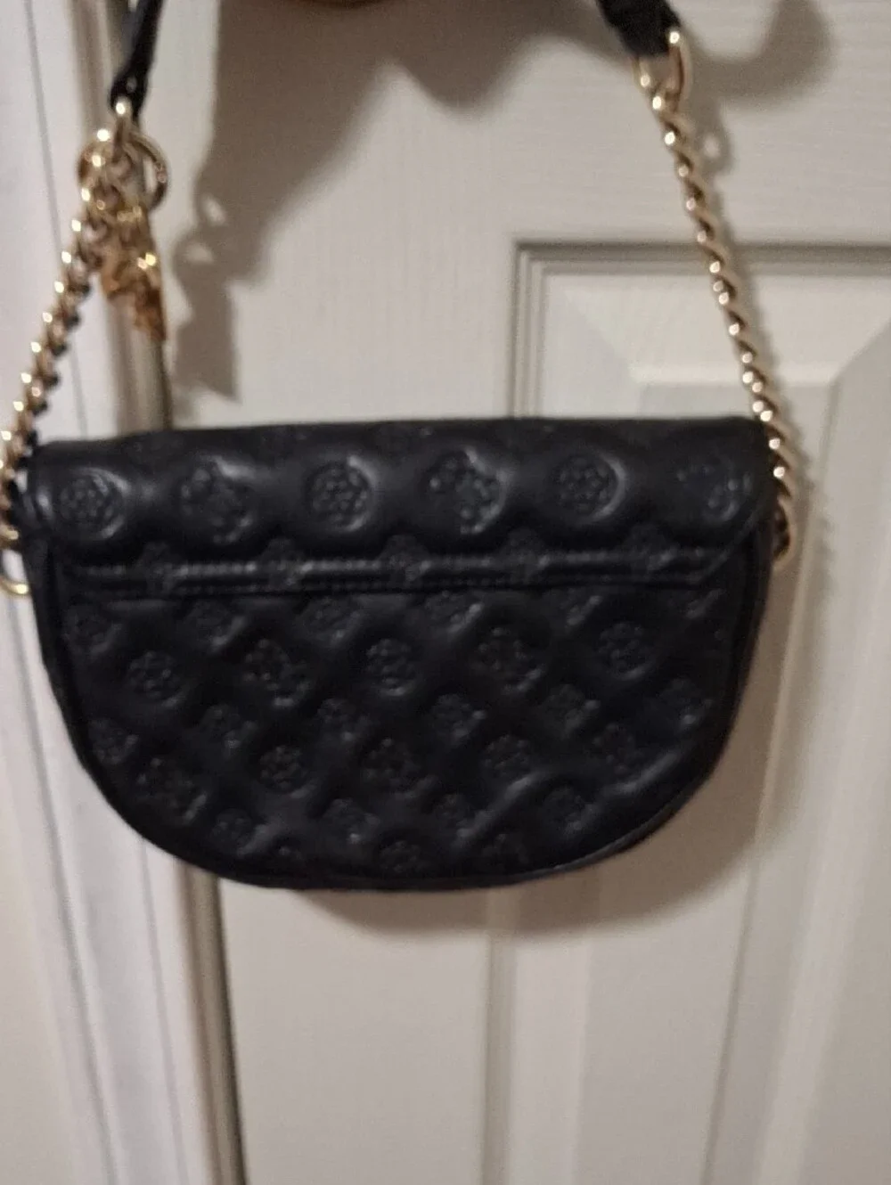 GUESS Black Embossed Leather Shoulder Bag with Gold Chain and Charm Accent